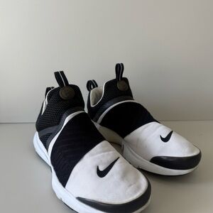 Nike Black and White Slip-On Sneakers